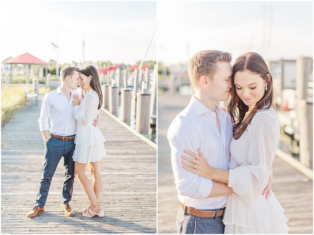 posing for their lewes delaware engagement photographer on the docks in lewes.